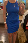 I really loved this dress but the large was just too tight and the extra large is loose within the midsection but not? - Amanda C.