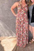 Bought this for my Bridal Shower and it was beautiful. I love the button clasp in the bust because I don't like a lot of cleavage showing. The side slit is very flattering too! - Kortney A.