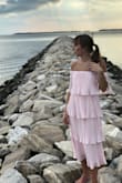 I loved this dress and got so many compliments. It did start to stretch and get a little too loose as the night went on, but overall it was great. - Jordynn C.