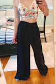 I wish these fit. They're so long it's almost funny. If the length was right these would be a great closet addition!! They don't have any stretch in the waist, so don't count on that if you're considering. - Rebecca M.