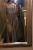 It's great. The dress is a little heavy and long but looks amazing. - Anita R.