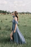 I decided to order a small knowing it would fit my upper body perfectly, however, I ended up having to hem it even with 4in heels on. Other than that it is now one of my favorite dresses! - Taylor B.