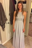 Medium was loose.

The small fits perfectly except for the length. It's long, although it will probably fit perfectly with heels.
I am wearing it as a bridesmaid dress. - Heather C.