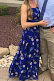 This dress fit great! I wore it to a wedding and received so many compliments. I am 5'10'' and this dress was the perfect length to wear with flat sandals, with heels it felt just a tad too short. I am also well built through the shoulders, back, and butt, while lacking in cleavage, and had no issues with the fit of this dress. - Kim W.