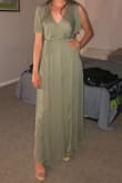 This dress looks way cuter online. The material is very cheap and see-through and the sleeves just look weird when you actually put it on. It's also complicated to wrap and the seams always bunch over or under the wrap strings, giving the dress a weird silhouette. I would not recommend this dress. - Sarah D.