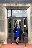 I wore this dress to my college graduation and it was perfect! So comfortable and super light so I wasn't too hot with the gown on also. The material was wrinkly and was hard to fix. I would say it was a little big in the shoulders for me but wasn't big enough to make me want to size down. - Marisa J.