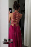 I loved it. It's so long though. I had to take it to a seamstress to shorten it, and it's a bit loose on the waist area. I wouldn't change anything from the dress though. - Marlen P.