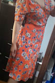 Let me start with I like this dress and can't wait to wear it with my navy heels... but it is extremely demure compared to my usual wardrobe. please note that I'm 5'4" and this dress hits mid-calf. On the model it looks about knee length. The zipper starts around mid back and goes all the way up, and I'd had trouble with a defective zipper in the same shipment so I worried it may get stuck before I had the chance to try on. Not this time! It did jam on the way down but it slid down gently on the second try. - Maudee G.