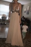 It's such a beautiful dress! The waist portion fits perfectly and the length is just right! Unfortunately the bra area is a little loose. I will have to get the top taken in a smidge. Wearing this as a bridesmaid in a wedding in September! You can tell this dress is made well. - Michele G.