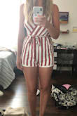 I loved this romper online and was super excited to try it on when it arrived, but sadly had to return it. The fit was very short, to the point where I could barely get the straps on my shoulders. 

Not only was it short, but the lining was longer than the outer shell so you could see it peeking out quite a bit at the hem. I might have considered exchanging for a larger size, but didn't want to risk receiving another one with poor construction. - Rebekah M.