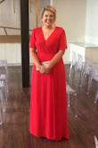 I was very skeptical about this dress when I ordered it and didn't have high expectations. I bought it for my sister's wedding as a last ditch effort to find a dress I didn't hate...this dress not only surpassed all my wishful thinking, it is quite possibly one of my favorite dresses ever! So comfortable and elegant and because of how it wraps and ties, you can really adjust it to fit you however you like it. The only issue was there is no clasp or anything in the front so I was constantly readjusting the front so my bra wasn't showing...also if you caught the tie string on anything the whole dress could unwrap in one swift motion...so I was very aware of making sure the tie was secure all night. Overall though, wonderful dress and I would buy in more colors! - Madeline Z.