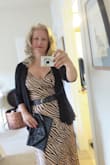I mostly like this dress, even though the strapping is a little tedious to put on. The material is light, the dress is comfortable and you can't beat the price. - Indra L.