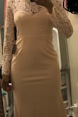Dress was nice. It was just too loose around the waist. I ordered a small. I could have ordered a xs for a better fit, but it would have been too tight since I am a bit curvy. - Princess Z.