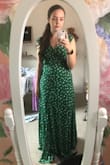 I love this dress so much! It's the perfect length and such a great color for my green eyes! It's pretty tight, so if your waist is 32+ I would get a large. - Allison J.