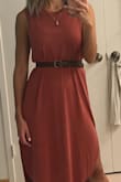 This dress is quite flattering (with a belt). It feels light and is a beautiful color! Easily dress up or down. Only con that was stated before was the large armholes. I wore a tank top underneath though, but aside from that the dress would be perfect. - Jessica W.