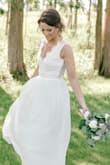 I got this dress for my wedding day and absolutely loved it! When I saw the forecast said 98 degrees for my wedding day I opted to get the sleeves removed, and it looked just as beautiful and elegant as with the sleeves. I received so many compliments! - Allison P.
