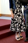 I wore these wedges for my nephew's baptism, & they were surprisingly comfortable & easy to walk in. The only complaint I have, like another review on here stated, is that the strap on the back that goes through the holes on the back by the ankle part does end up slipping & coming down to your heel & it is pretty annoying. Totally fixable though. Perhaps maybe with some glue? It is a beautiful & versatile shoe. It can be worn for different occasions. 
They do run large. I would totally size down a full size. I am a 6 & sized down to a 5 & they fit perfectly. - Nancy S.