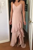 Ended up returning this because it was the tiniest bit baggy in the hips and because it was long. I wasn't sure how they would hem it given the ruffles. It was definitely wearable though and so much fun! I would recommend this dress! - Theresa O.