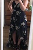 I love this dress. I was concerned about the length of it since I'm pretty short, but I'm pairing it with some brown wedges and even though it still drags about an inch on the ground, it looks great :) Plus, the wrap dress style means the sizing is pretty forgiving. The fabric is a little thin so maybe throw in some pasties if you're planning to go bra-less. It's a great dress and I can't wait to wear it to my friends wedding! - Julia V.