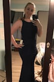This dress is so wonderful. I'm really excited to wear it. 
The dress is made with a stretchy (and a little thick) material that is very flattering. - Traci B.