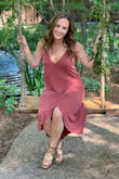 This dress was perfect for a wedding I attended in July. Fabric is super breathable and the size small hit at the perfect length for someone my height (no dragging!) with a small 2" heel. One warning: if you plan on dancing like madness, wear double sided tape on your chest or there will be a peep show as the dress tends to want to shift. Couldn't wear a bra but that's expected. It also goes well being dressed down with a big denim jacket for a night out with girlfriends. - Christina K.