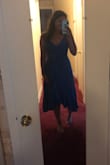 It's a gorgeous dress but definitely not the color that is pictured which is pretty much what all the other reviews said. I have a pair of pants that were more towards the color pictured for a comparison(actual dress on left; pants on right). True to size (s) and still gorgeous. - Meghan H.