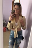 This shirt is just so adorable. As you can imagine, it does show some skin, but with high waisted jeans and a bralette its totally fine! It's super lightweight so I find it easy to wear now even though it's warmer out! - Joelle C.