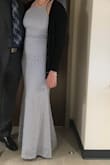This dress fit true to size for the most part, was a little bit roomy in the bust for me. Doesn't necessarily require a bra to be worn which I liked but I would have liked to wear one with this since it was so roomy for me. Dress was also bit tight in the midsection for me, would have ordered a size up. Loved the lace detailing on the dress and the high neck. - Elizabeth S.