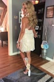 Wore this to my friend's daughter's Sweet 16 and got a million compliments. The length is perfect, it covers your boobs but makes you feel like a million bucks! Pair it with a pair of sparkly heels and STRUT!!! - Christine B.