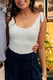 Love this body suit! It's very soft and has thick material, so it's not see through. I ordered an XS and it fit great, but I'm sure a S would have fit just fine too. - Elena T.
