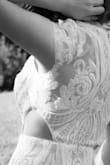 I ordered this dress for a wedding anniversary photoshoot and it didn't disappoint. As a petite I had to get the length adjusted to avoid stepping on it, but the waist hit just at the right place and was super flattering. Sharing some closeups of the details. - Mimi H.