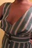 Unfortunately, that isn't me. I love the color, but that's about the only thing that I love about this dress. The XS is tight in the waist (I usually order a S) and still too big in the chest, as you can see. - Michelle S.