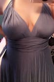 This dress is beautiful and perfect for a summer wedding. It's on the heavier side which is great for breeze. The material is great and lined so you don't have to worry about it being see through. And I LOVE that the straps are customizable. This dress is great and I will definitely order in another color. - Dawnae G.