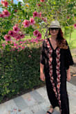 This dress is stunning! I bought it for my trip to Hawaii, and I can't wait to wear it! It's actually quite soft and very airy. I love the side slits as well. Def would recommend this dress! - Rachel K.