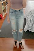 I have had such a hard time finding distressed mom(ish) jeans that fit me and don't make my butt look awful. I have a tiny booty and it usually gets swallowed up by loose jeans. Not these! Butt looks cute and they fit perfectly around my waist and legs too. - Rita A.
