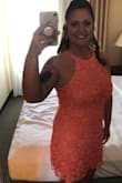 I wore this to a wedding. It was beautiful on and the coral color was very flattering on tanned skin. - Jamie H.