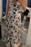 I bought this dress for my daughters christening. It fits perfectly !!! I tried it on without heels so it's long for wearing flats but once I put some heels on it will be perfect. Super flowy and comfortable. It's beautiful!! I ordered a L and an XL. The L fit perfectly I didn't even have to take the XL out of the packaging. - Julie H.