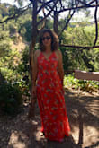 I bought this for a summer formal wedding I was attending. Even in the 99 degree heat, I felt cool and comfortable. Well made, I had it altered for the hem length and the adjustable straps needed shortened slightly. I'm 60 years old and I was looking for long & flowing but mostly finding dresses with plunging necklines or thigh-high slits, which for a woman my age seemed tacky. This dress was perfect. Not too plunging at the neckline and no skirt slit. The delicate ruffling on the skirt and scrunching on the bodice felt so feminine. I loved wearing it. - Jeanne B.