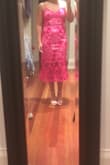 This dress fits perfectly. I wear a 36A when I want to be comfortable (I have a wide rib cage) so with this dress, I can't wear a bra. I don't have big hips so I don't fill it out fully in the hip area but it still looks amazing. The back is stunning with the nice zipper. The colour is just as fuchsia as it seems online. The slip does slip up a bit but I'm sure if you wore spanks it wouldn't. It arrived in Canada within 10 days of ordering online without paying for shipping. Super happy with this purchase. - Lauren K.