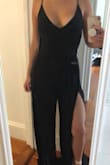 This is by far the best romper I have worn, it is SO FLATTERING. The material is amazing, it streches and is very soft. The straps, although not adjustable, are the perfect length. The slits are sexy and make this outfit perfect for date night or going out with the girl. The only thing I will have to tweak is the length. I am 5'4" and even with 3 inch heels, the legs are a couple inches too long but it's an easy fix!
You won't be sorry! - Emily A.