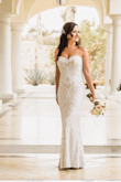 This dress was stunning. While taking photos so many hotel guests stopped and commented on how beautiful the dress was. It was so comfortable too! I loved how it had some stretch to it but still managed to hold it shape in the Cabo heat. I wore it with some spanx and a strapless bra under for some extra support although I could have done without either. Highly recommended. PS - I also went with a Med because I didn't want it too tight in the chest and stomach area, I only needed to shorten the length. - Salina F.