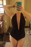 I've been on the hunt for a sexy black one piece for ages. I have a longer torso so one piece suites typically look off on me. That's not the case with this one. It fits perfectly. I love the modest bottom with the sexy top. It's sexy without being too revealing and everything stayed in place. Perfect for a day by the water with the family. - Lacie G.