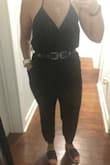 I'm tall and it's hard to find a jumper (or romper) that fits my long torso without giving me a wedgie the whole time. This one is perfect! The halter can be tied/adjusted. I conveniently had a belt like the model had on and it breaks up the black and gives some waist definition. - Roni W.