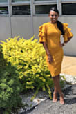 I call this dress my cha cha dress because of the sleeves. Color is warm and vibrant. Thick material. Fits perfectly. My favorite part was the sleeves of course. Wore this for my birthday and got lots of compliments. I love this color in general on myself. You won't be disappointed with this dress. - Jade M.
