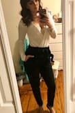 I have a long torso so it as a little tight but I still loved it. A very deep V so it's super cute with a nice lace bra under it. - Auriel G.
