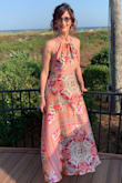After lots and lots of searching in stores and on several websites, I was absolutely THRILLED to find this dress for a destination beach wedding in Hilton head Island! It was PERFECT, and my search was finally, and happily over! :)) I ordered two different sizes to try on because I didn't have much time to wait for another shipment, as the wedding was only about a week away. The free return policy made the choice to do so less stressful, and easily returnable. I received it before the expected delivery date, which was a welcomed surprise. The small was a bit tight, and the placement of the pattern wasn't as pictured, which threw the whole thing off. Luckily, the medium was as pictured, with the pattern correctly placed, and the fabric was light and breezy. The cut of the halter top was super cute, and unlike many of the dresses that I had looked at, this one enabled me to wear a strapless bra comfortably, and without worry that it would show. Many of the other dresses I'd looked at had low or strappy backs, so this was stress free. I thoroughly enjoyed wearing this all night, and felt like a princess! Yay!!! Thanks Lulus! ;)) - Nancy F.