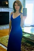 I was a little hesitant purchasing this dress in Royal Blue since not many other reviewers had bought that color. I ended up buying it in blue and green, and I LOVE the blue on me. It's a little long, but I'm hoping platform shoes will remedy that issue. I feel sexy and elegant in this dress. I can't wait to wear to my nephew's wedding! - Vicky H.
