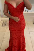 The dress is gorgeous, but I feel like it runs tight on top. The fabric is beautiful and the color is a faded red. I loved it but I feel like it might be uncomfortable to move around since the arm area is so tight even while wearing a M when I can usually fit into a S. - Karina C.
