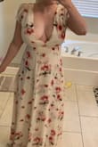 It's a light, beautiful and feminine dress. I'll have to adjust the cleavage since it is just way too low, but it's still a very cute dress. - Karina C.