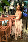 Really good quality! I am really tall but it was floor length I wore it with flats. - Anne C.